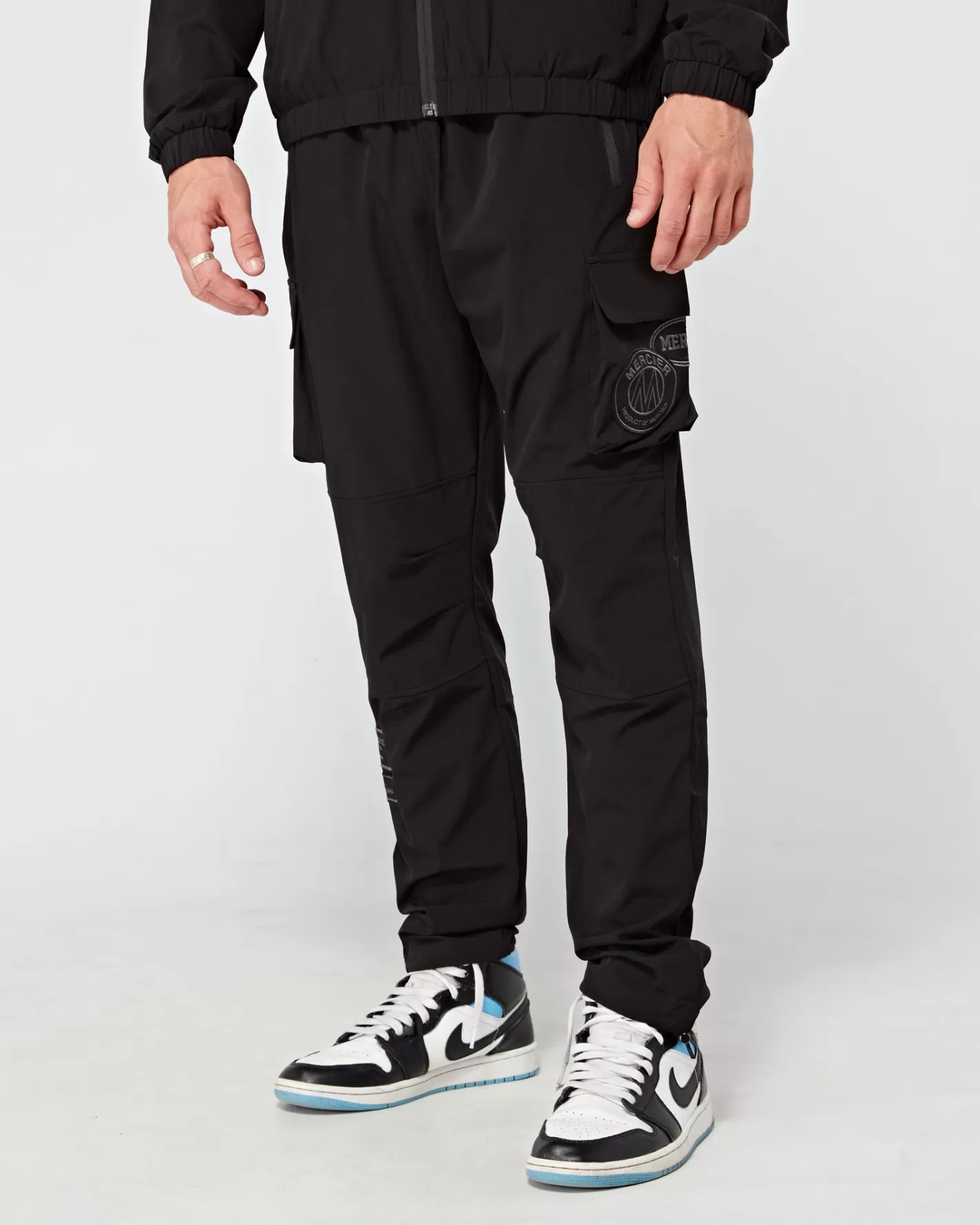 Homme Mercier Coupe-vent Et Cargaisons<Cargos de badge tonal noir